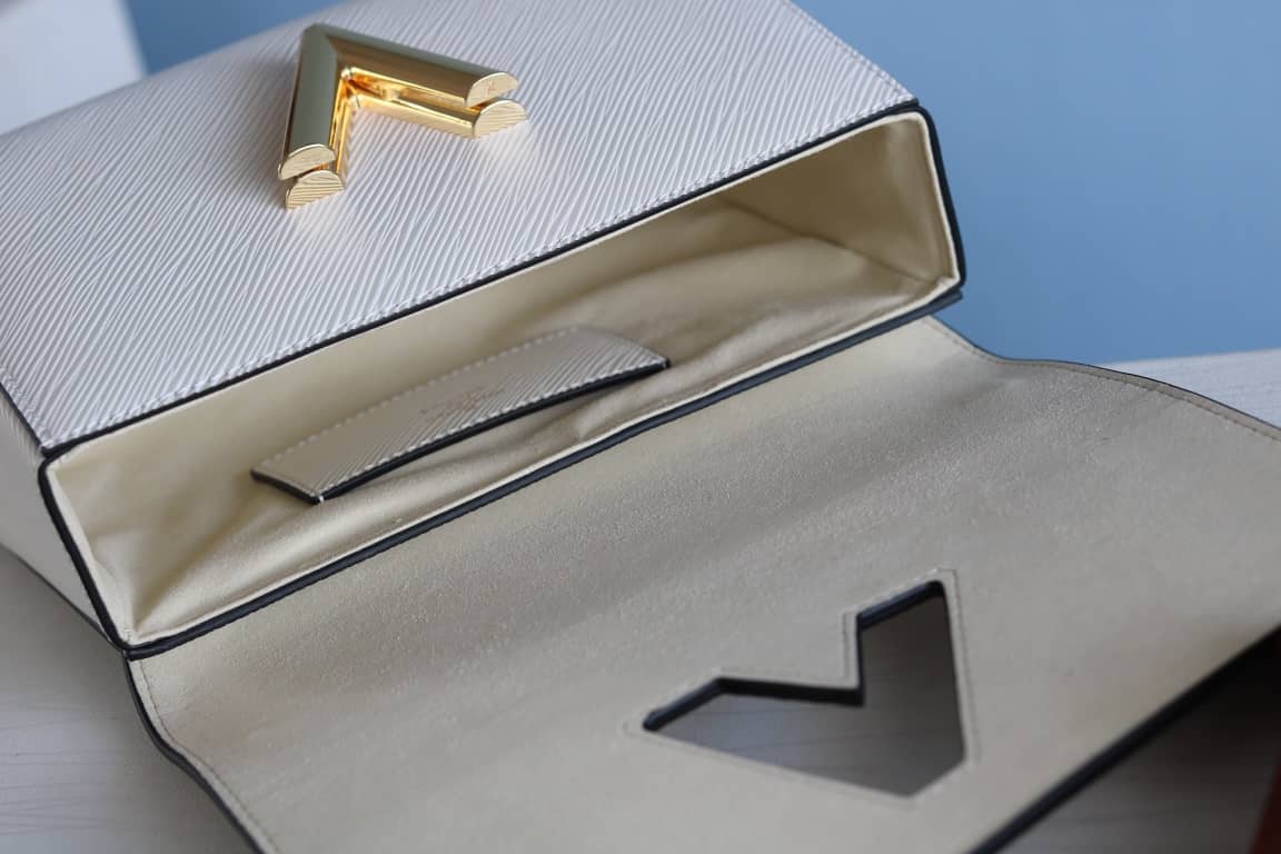 L0vis Vvtt0n Textured Epi Leather Twist Series Bag