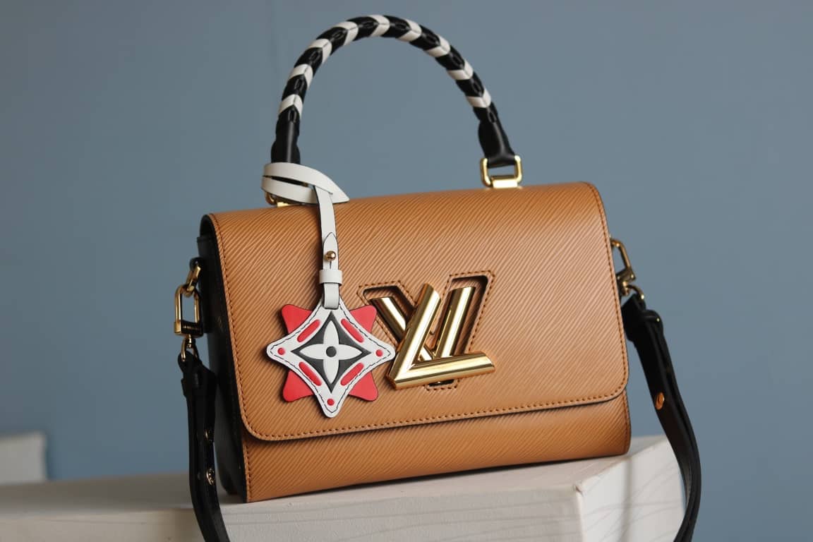 L0vis Vvtt0n Textured Epi Leather Twist Series Bag Brown