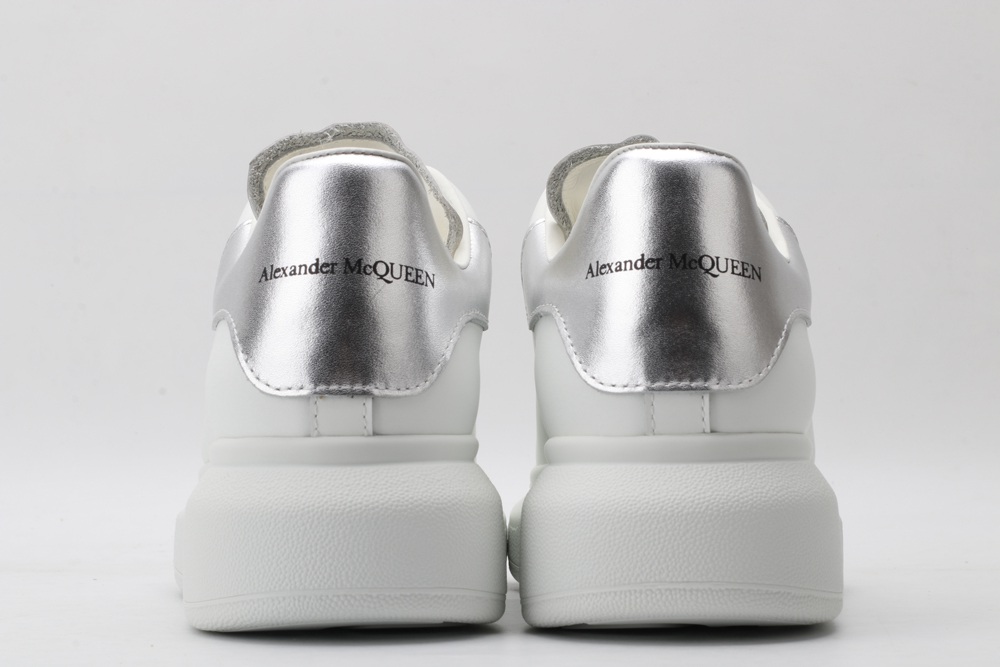AMQ oversized sneakers with siL*Ver heel