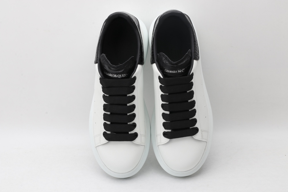 AMQ OVERSIZED SNEAKER with blue stamped python heel